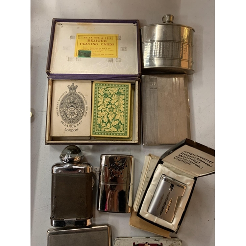 96 - A COLLECTION OF PLATED CIGARETTE CASES, LIGHTERS, ETC