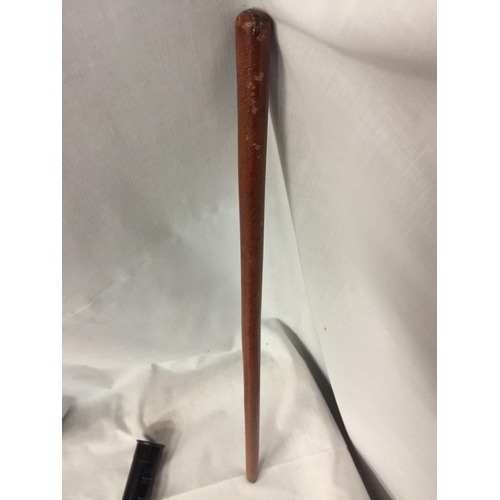 359 - A LEATHER COVERED SWAGGER STICK AND AN INERT ANTI RIOT ROUND (2)