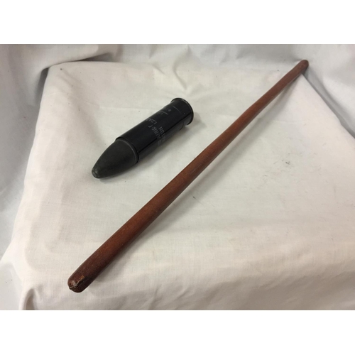 359 - A LEATHER COVERED SWAGGER STICK AND AN INERT ANTI RIOT ROUND (2)