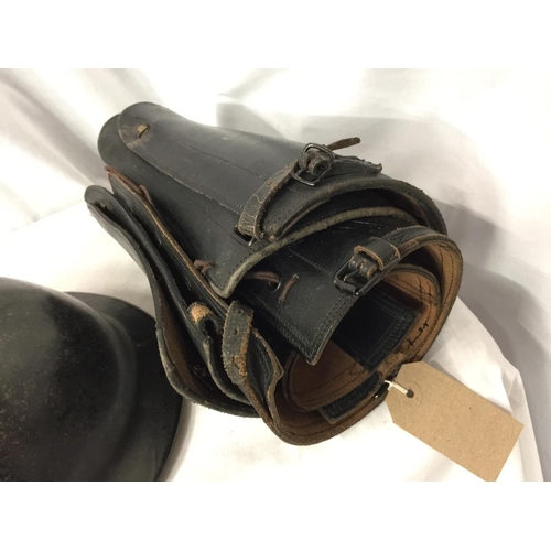 408 - A CIVIL DEFENCE PLASFORT HELMET AND LINING AND TWO PAIRS OF BLACK LEATHER GAITERS