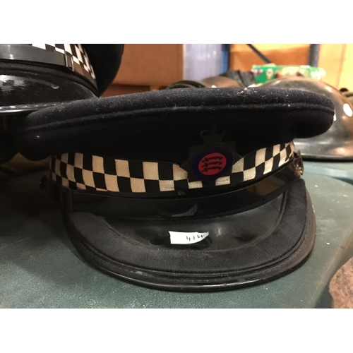 414 - FIVE ASSORTED BRITISH POLICE HATS, TO INCLUDE GUERNSEY, LEEDS CITY, SCOTLAND ETC