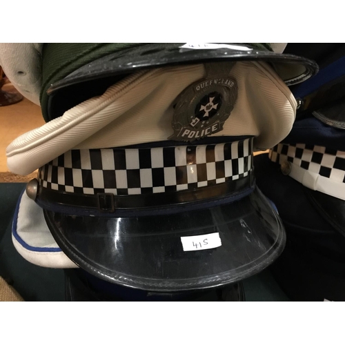 415 - NINE ASSORTED POLICE HATS, TO INCLUDE QUEENSLAND, GERMAN U.S. ETC