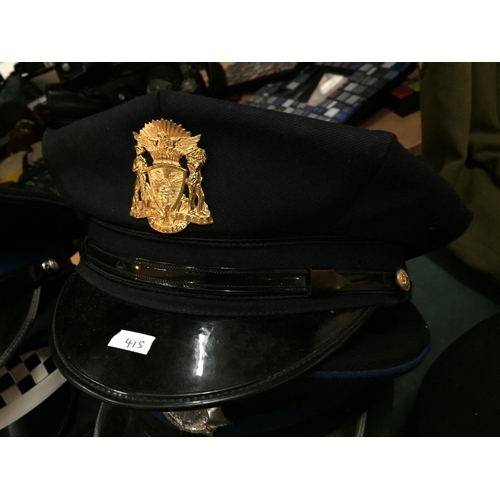 415 - NINE ASSORTED POLICE HATS, TO INCLUDE QUEENSLAND, GERMAN U.S. ETC