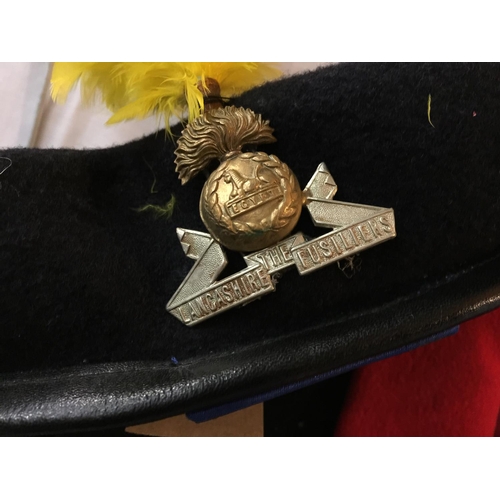 432 - A ROYAL ARTILLERY MESS UNIFORM COMPRISING JACKET AND TROUSERS AND A LANCASHIRE FUSILIERS BERET