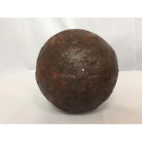 451 - A LARGE CANNON BALL FROM H.M.S. ASSOCIATION WHICH SANK IN 1707