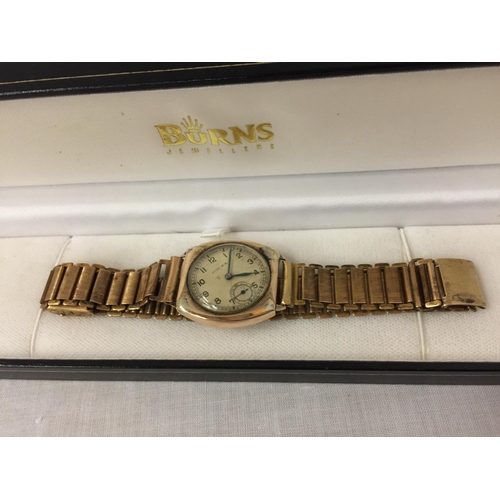 452 - A WORLD WAR II 9CT GOLD ROLEX GENTS WRISTWATCH WITH ARABIC NUMERALS, THE BACK WITH ENGRAVED INTIALS ... 