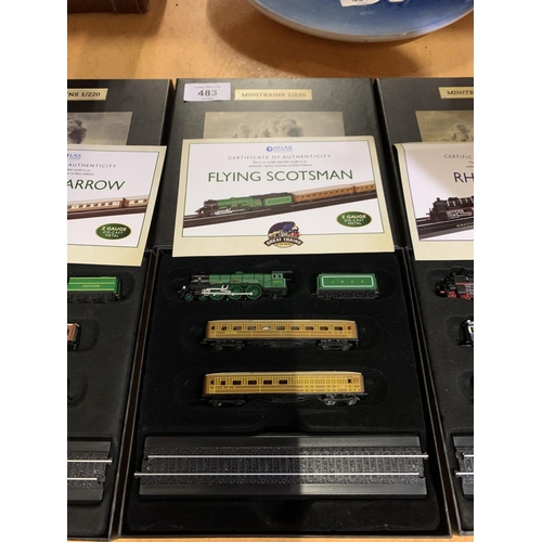 483 - THREE BOXED MINIATURE TRAINS, THE GOLDEN ARROW, THE FLYING SCOTSMAN AND THE RHEINGOLD