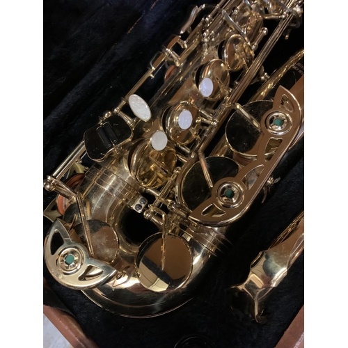 486 - A GOLD LACQUERED E.L. RHART SAXOPHONE IN CASE