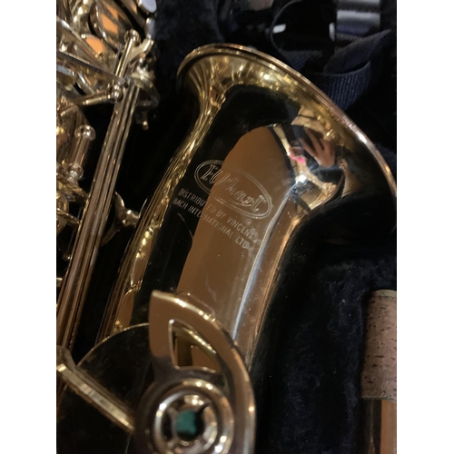 486 - A GOLD LACQUERED E.L. RHART SAXOPHONE IN CASE