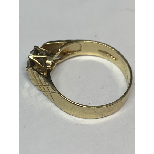 517 - A 9 CARAT GOLD DIAMOND CHIP RING WITH DECORATIVE SHOULDERS SIZE L/M