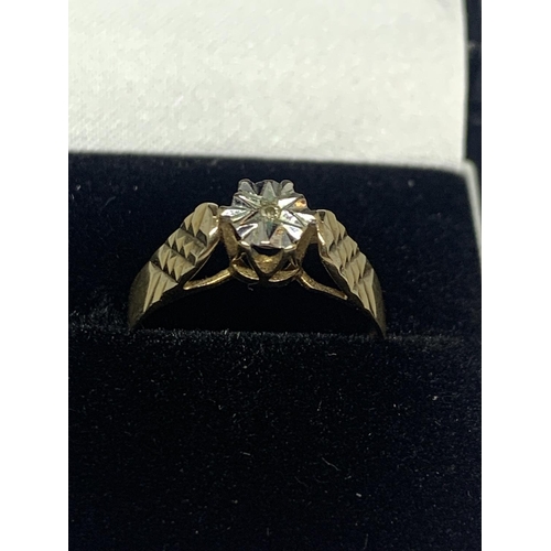 517 - A 9 CARAT GOLD DIAMOND CHIP RING WITH DECORATIVE SHOULDERS SIZE L/M