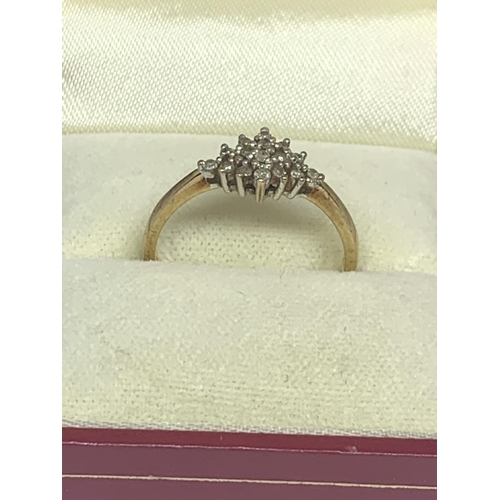 518 - A 9 CARAT GOLD RING WITH DIAMONDS IN A DIAMOND SHAPE DESIGN SIZE 0 WITH PRESENTATION BOX