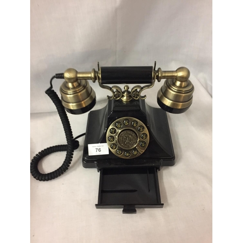 76 - A VINTAGE STYLE BLACK AND BRASS PUSH BUTTON TELEPHONE WITH A PULL OUT NUMBER TRAY