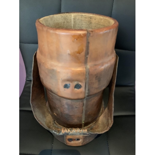 466 - A MILITARY LEATHER POWDER FLASK