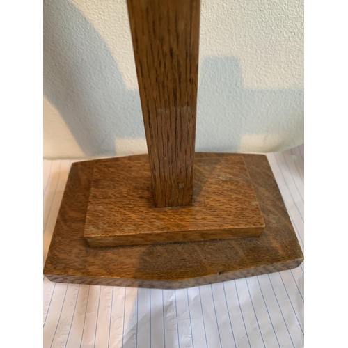 479 - AN OAK ARTS AND CRAFTS CANDLESTICK