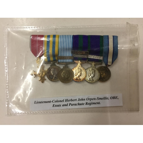 462 - A MINIATURE MEDAL GROUP AWARDED TO LIEUTENANT COLONEL HERBERT JOHN ORPEN-SMELLIE O.B.E. OF THE ESSEX... 