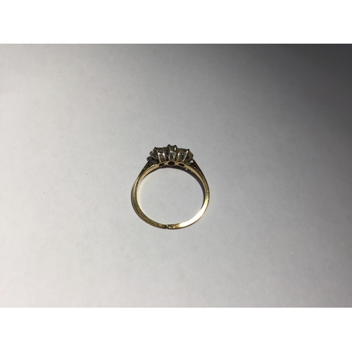 507 - AN 18 CARAT GOLD RING WITH THREE IN LINE DIAMONDS SIZE L/M (RING WORN THIN) GROSS WEIGHT 1.7 GRAMS