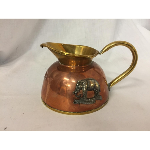 439 - A COPPER AND BRASS 19TH ALEXANDER HUSSARS JUG