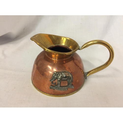 439 - A COPPER AND BRASS 19TH ALEXANDER HUSSARS JUG