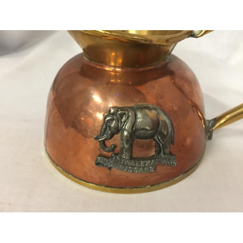 439 - A COPPER AND BRASS 19TH ALEXANDER HUSSARS JUG