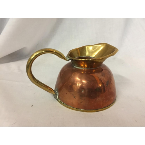 439 - A COPPER AND BRASS 19TH ALEXANDER HUSSARS JUG