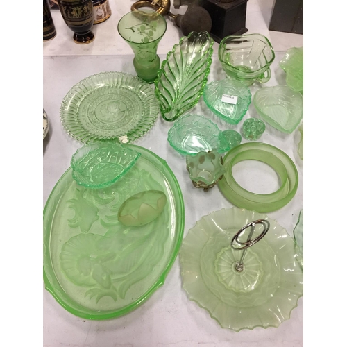 214 - A QUANITY OF GREEN GLASSWARE TO INCLUDE LEAF SHAPED BOWLS, PATTERNED PLATES, BOWLS, PLATES, ETC