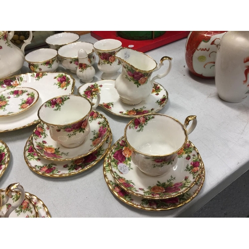 31 - A LARGE COLLECTION OF MAINLY ROYAL ALBERT 'OLD COUNTRY ROSES' TO INCLUDE TEA POT, TRIO'S, SUGAR BOWL... 