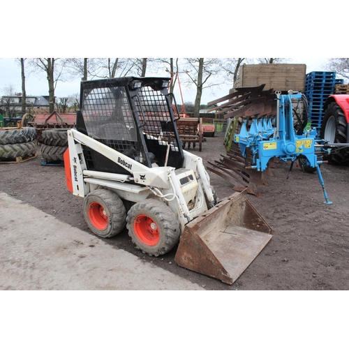 127 - A BOBCAT SKID STEER WITH BUCKET AND MADE 2