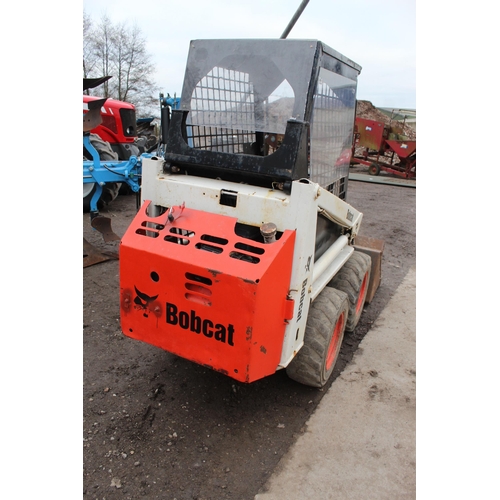 127 - A BOBCAT SKID STEER WITH BUCKET AND MADE 2