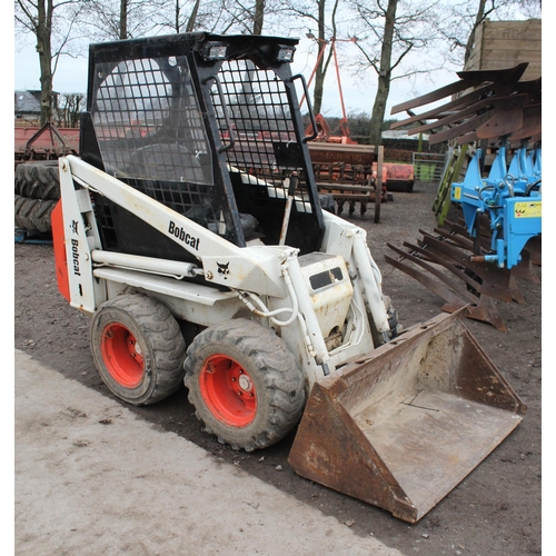 127 - A BOBCAT SKID STEER WITH BUCKET AND MADE 2