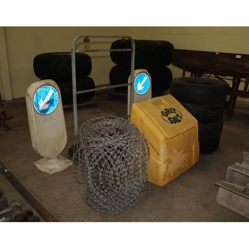 47 - AN ASSORTMENT OF ITEMS TO INCLUDE A GRIT SALT BOX, FOUR TYRES, TWO TRAFFIC SIGNS AND WIRE ETC NO VAT