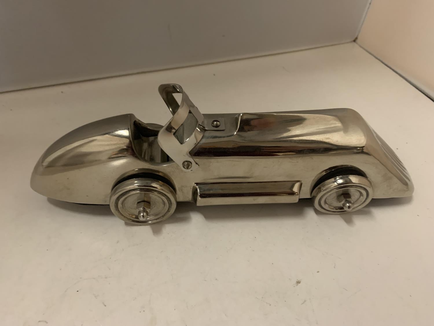 A CHROME RACING CAR