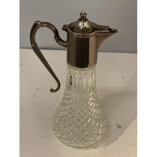 36 - A GLASS CLARET JUG WITH A SILVER PLATED HANDLE AND TOP (ENGRAVED ASHTON ON MERSEY G C LAWSON CUP 3RD... 