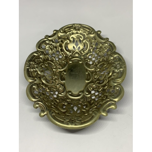 71A - A DECORATIVE WHITE METAL DISH