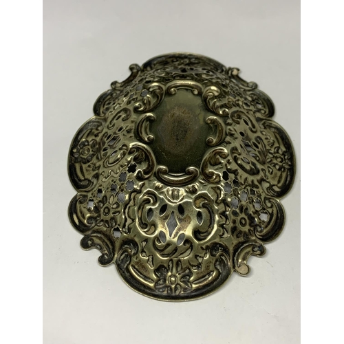 71A - A DECORATIVE WHITE METAL DISH