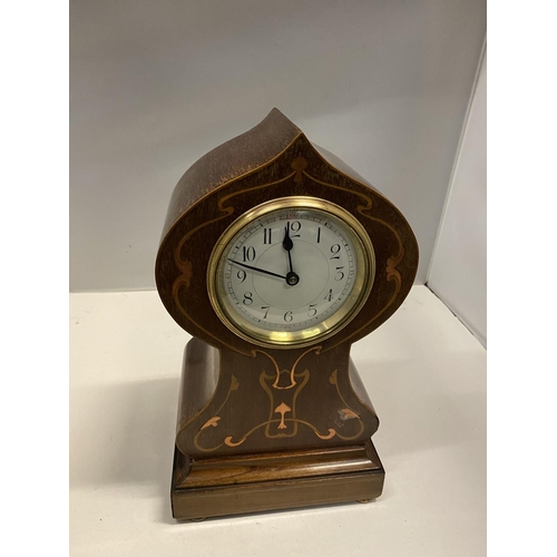 84 - AN ART NOUVEAU STYLE MANTLE CLOCK WITH COPPER INLAY