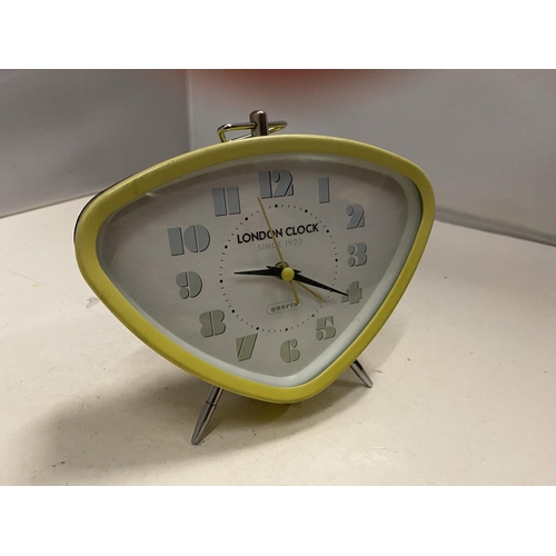 88 - A RETRO YELLOW ALARM CLOCK