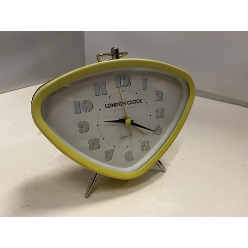 88 - A RETRO YELLOW ALARM CLOCK