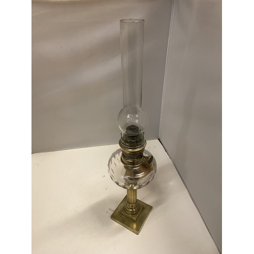 106 - A GLASS AND BRASS VICTORIAN OIL LAMP HEIGHT 56CM