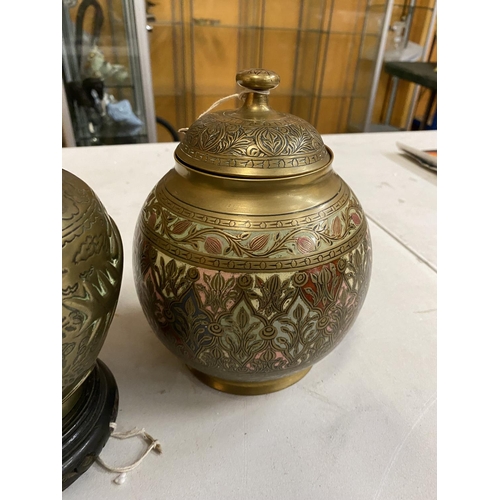 163A - AN ORNASTE LIDDED JAR STAMPED WITH MADE IN BRITISH INDIA HEIGHT 18CM AND A BRASS JAR DECORATED WITH ... 