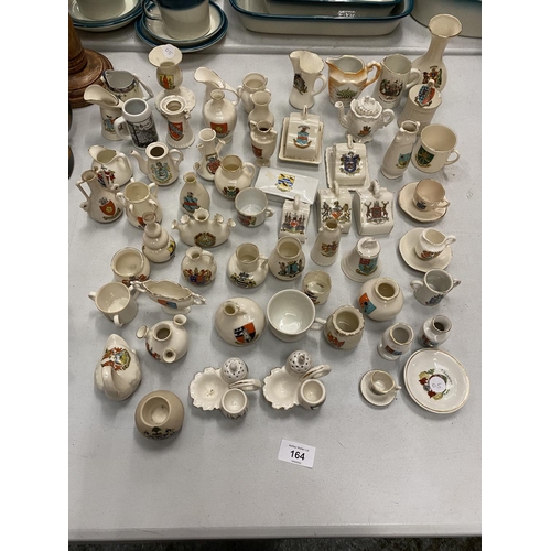 164 - A LARGE QUANTITY OF MINIATURE CRESTED WARE PORCELAIN TO INCLUDE, JUGS, CUPS, VASES, ETC