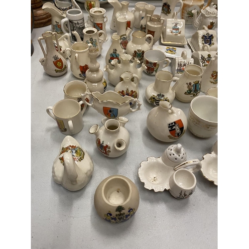 164 - A LARGE QUANTITY OF MINIATURE CRESTED WARE PORCELAIN TO INCLUDE, JUGS, CUPS, VASES, ETC