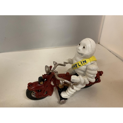 196 - A CAST MODEL OF A MICHELIN MAN ON A MOTORDBIKE