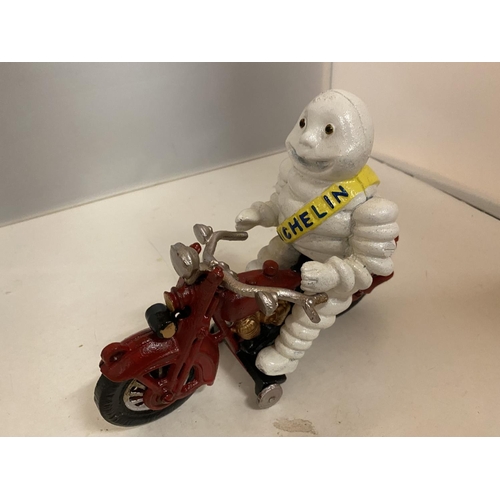 196 - A CAST MODEL OF A MICHELIN MAN ON A MOTORDBIKE