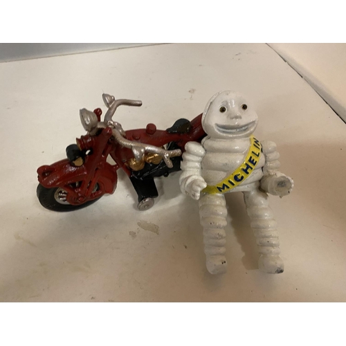 196 - A CAST MODEL OF A MICHELIN MAN ON A MOTORDBIKE