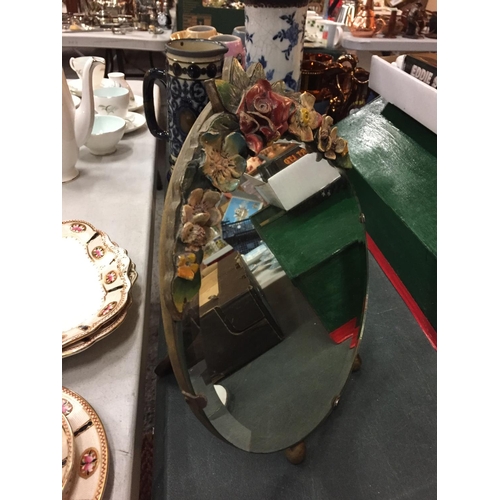 250 - A VINTAGE OVAL BARBOLA MIRROR HEIGHT APPROX 30CM