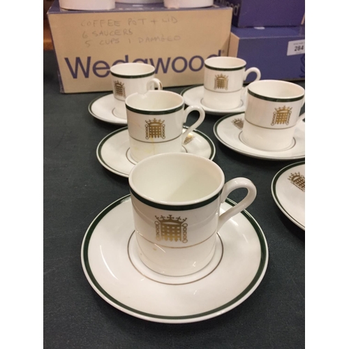 284 - A WEDGWOOD HOUSES OF PARLIAMENT COFFEE SET TO INCLUDE 6 CUPS- 1A/F, 6 SAUCERS, A COFFEE POT, CREAM J... 