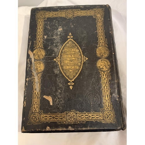 324 - A VERY LARGE AND HEAVY LEATHER BOUND COLOUR ILLUSTRATED WELSH BIBLE IN FINE CONDITION. PUBLISHED BY ... 