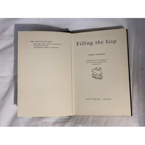 394 - A FIRST EDITION HARDBACK 'FILLING THE GAP' BY TERRY THOMAS (NO DUSTCOVER) PUBLISHED BY MAX PARRISH L... 