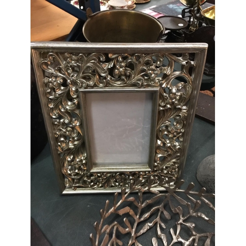 475 - A WHITE METAL COLOURED WOODEN PHOTO FRAME 33CM X 28CM, TWO CANDLE HOLDERS IN THE SHAPE OF STAGS, BOW... 